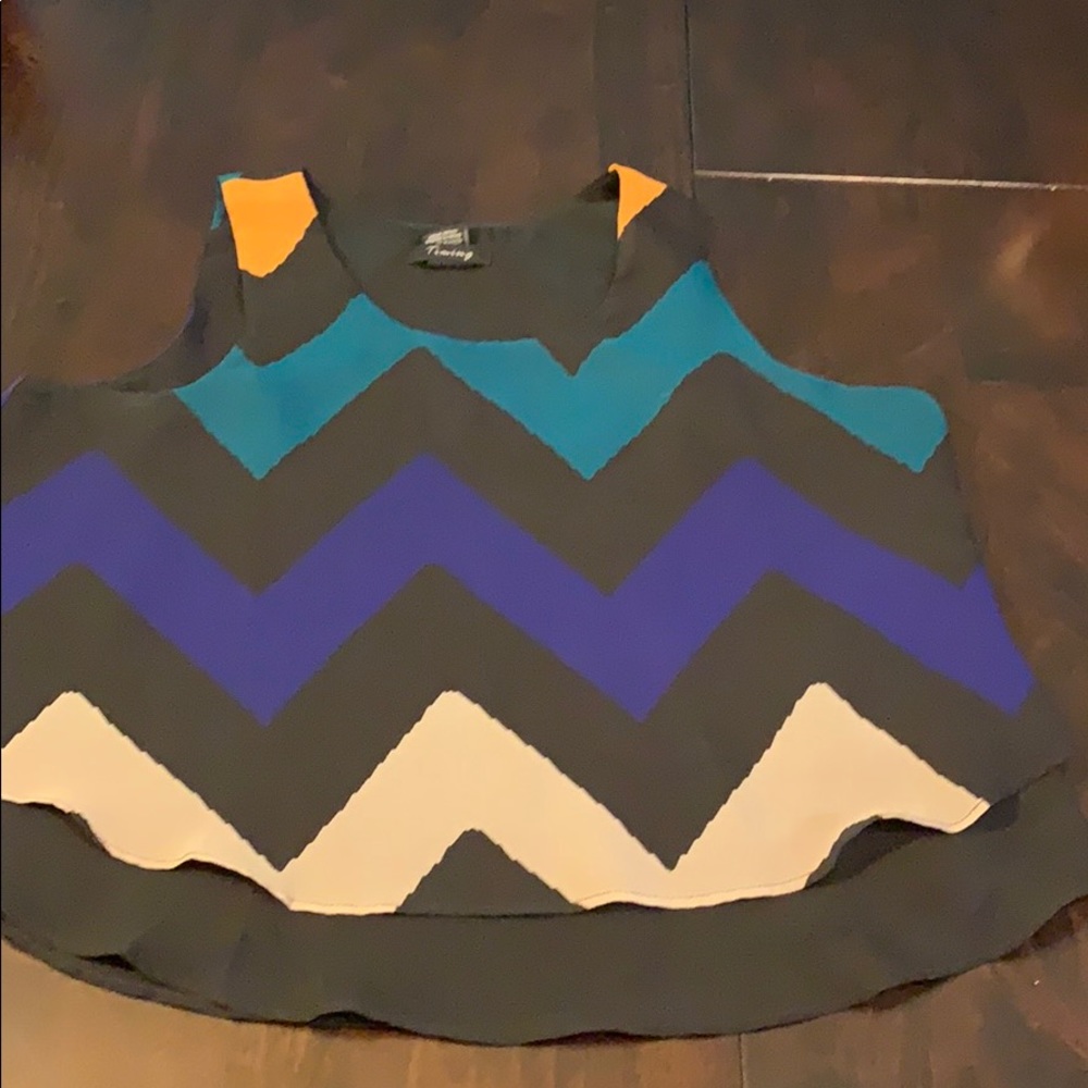 Sheer sleeveless shirt.